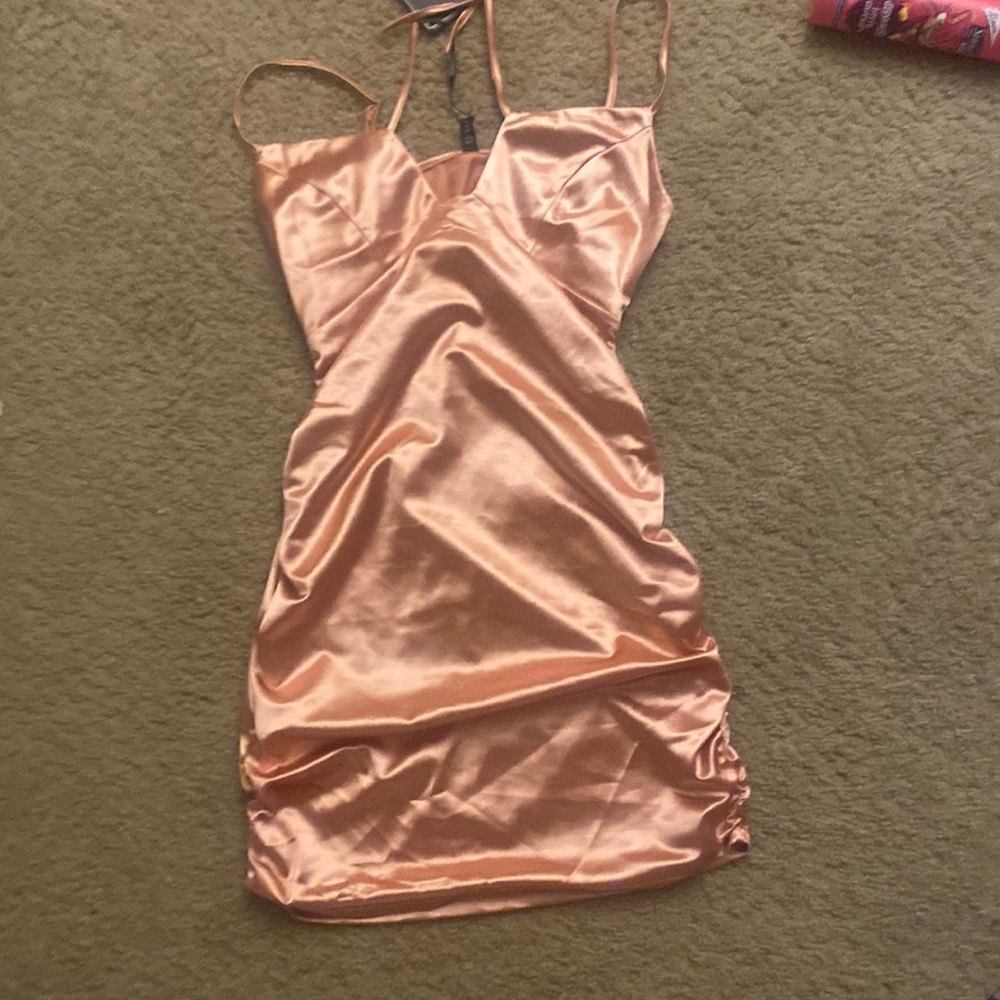 Pink Satin dress. Never been worn.
